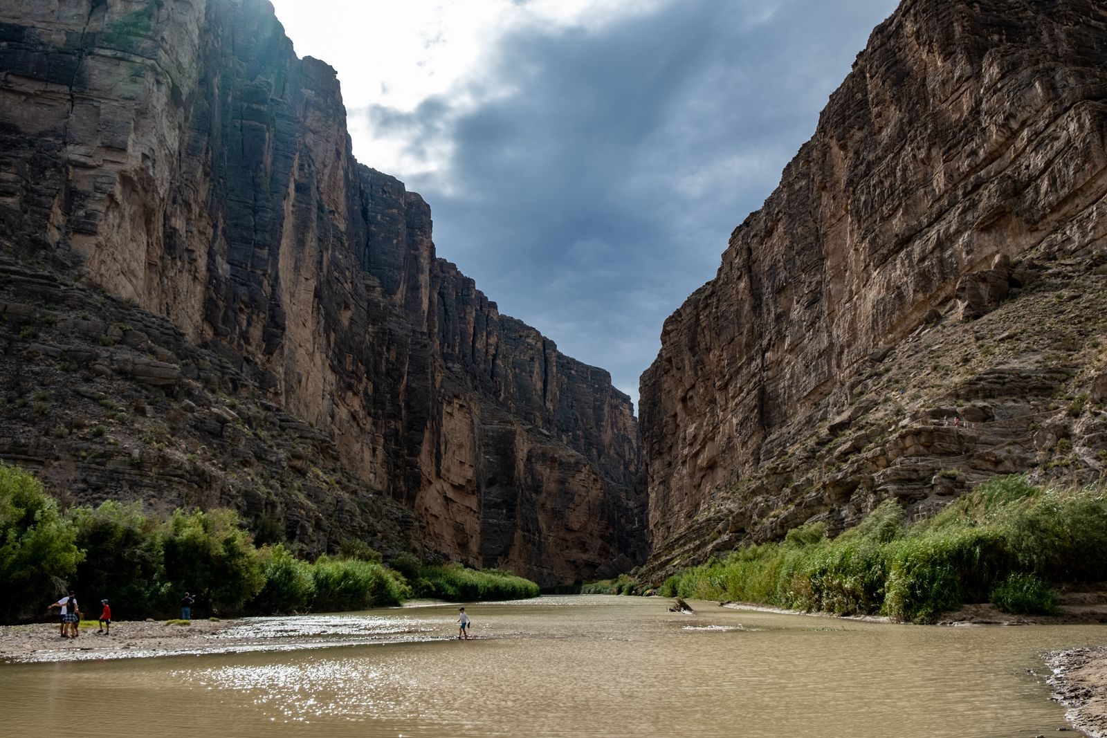 The sheer rock walls of Santa Elena Canyon in Big Bend National Park, with the Rio Grande flowing out between them